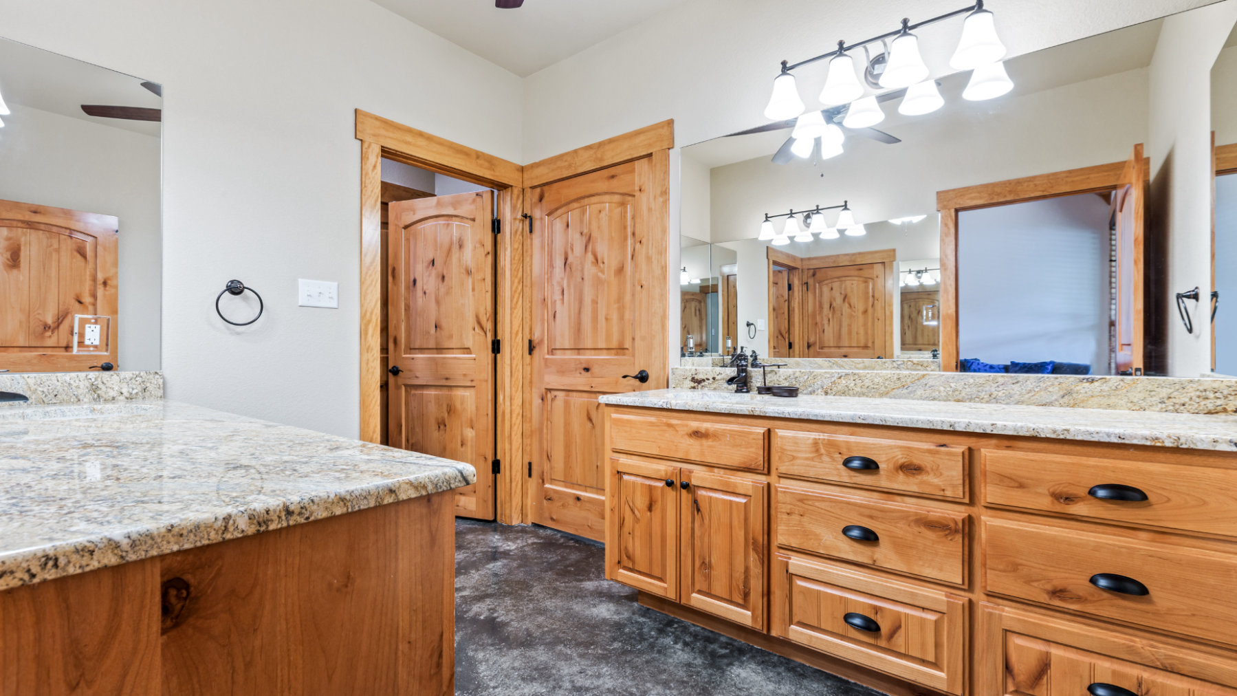 a kitchen with wooden cabinets